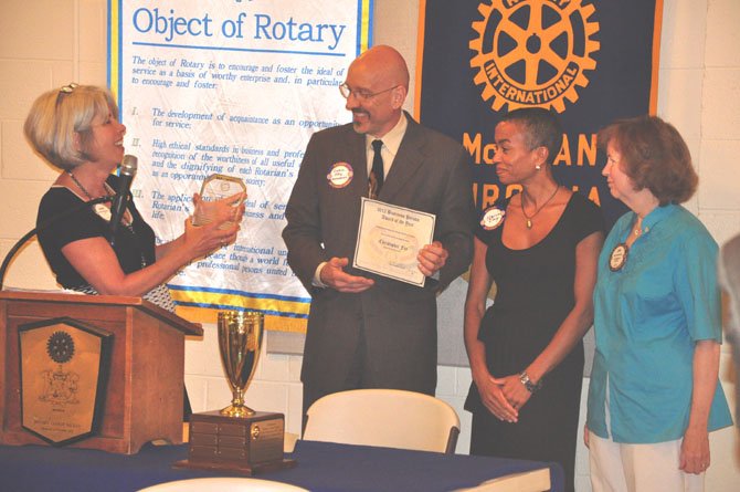 From left, McLean Rotary Club President Cherry Baumbusch, Christopher Fay of Homestretch, his wife Claire and McLean Rotary President-elect Jan Auerbach at the Rotary's June 12 meeting, where Fay was awarded Business Person of the Year. 