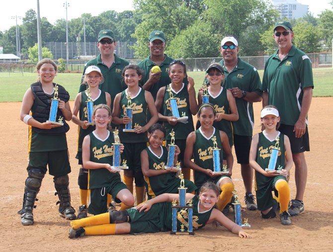 Members of the Fort Hunt 10U All Star Team. Prone: Scarlett Anderson, kneeling, from left, Megan Huck, Nekia Aiken, Sophia Castillo, Farrin McMaster, standing, from left, Jennavieve Miller, Maggie Daly, Caroline Magro, Tiffany Stowers, Claire Davidson, and back row from left, John Daly, Craig Stowers, John Castillo and Daryl Davidson. Not pictured is 10U all-star Leia Surovell.