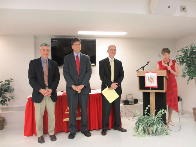 Tom Fraim, Mike Fitzella and Tom Bauer accept Golden Eagle award on behalf of the Optimist Club of Greater Vienna.  At right is Susan Bauer, Alpha Nu member, who nominated the Optimist Club of Greater Vienna.

