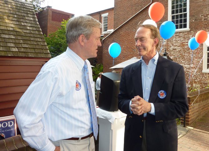 Republican candidate for City Council Bob Wood, left, talks with Michael Sauls at his campaign kick-off event June 14 in the Gadsby's Tavern courtyard.
