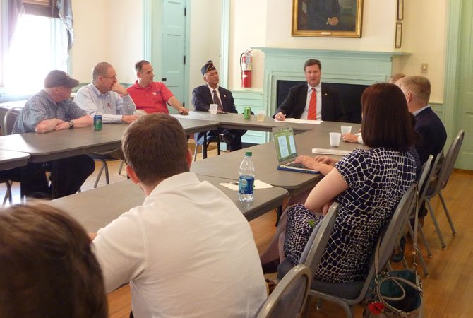 Republican candidate for Senate George Allen speaks at American Legion Post 24 in Alexandria June 14 during a roundtable discussion of veterans affairs issues.
