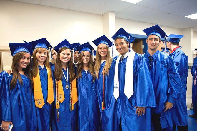 The B’s have it! In the halls of Fairfax High School, students line up alphabetically to process into their commencement ceremony on June 14. Pictured from left: Kristin Baird, Alysa Baird, Tiffany Balbuena, Eric Barfield, Jessica Barreto, Leah Barker, Maruo Bekhit and Zach Bennett.