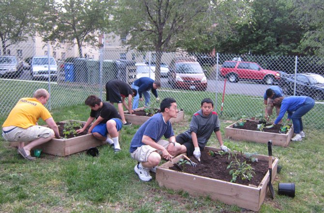 Hunting Creek Garden Club helps with summer care and maintenance of garden beds that members developed in the spring for Community Lodgings.