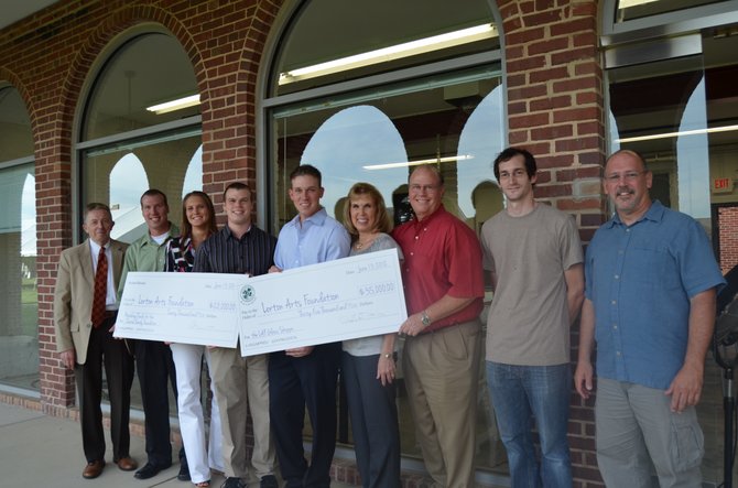 On June 13, Ron Devine, of the Devine Family Foundation, presented Lorton Arts Foundation President & CEO John Mason with a $35,000 check from the Devine Family Foundation and a $20,000 matching donation from Richard Hausler, Chairman of the Lorton Arts Foundation Board.