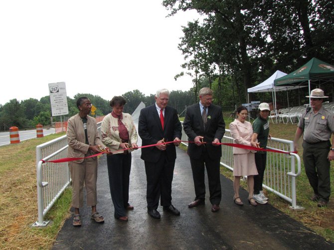 U.S. Rep. Jim Moran joins local and state officials, community advocates for ribbon cutting.