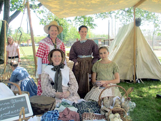 Civil War-era ladies Sherri, Hannah Yerger [front], HVI president Anne Stuntz and Rebecca Stricker, were knowledgeable and happy to describe their goods.

