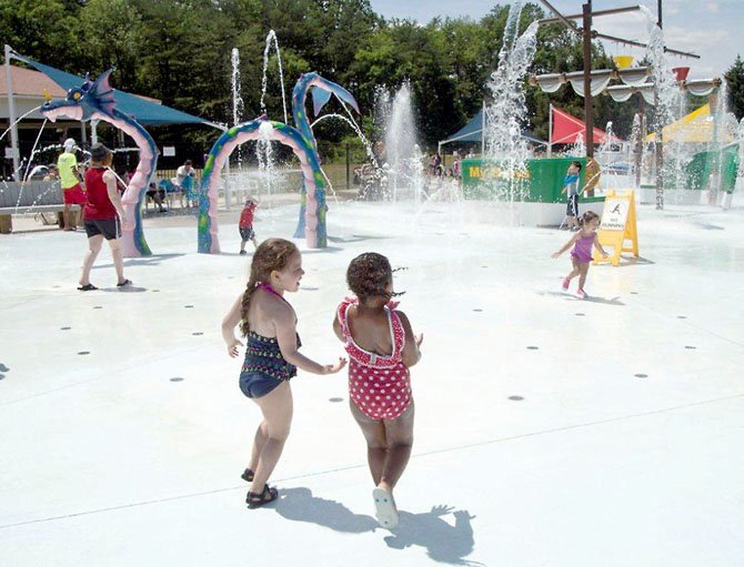 Children have a blast at the Our Special Harbor Sprayground in Franconia.