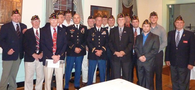 Newly installed officers and executive board members of American Legion Post 24 pose for a group photo. Pictured are: Erik Campbell, Dick Evans, Henry Dorton, Commander Bill Aramony, Jim Bertine, Jerome Schorr, Jim Taylor, Steve Flamm, Fred Brink, Mike Sawyers, Jim Glassman, Paul Moffett, Chance Wiley, Jared McMullen, Jesse Stevens and Dan Dellinger. Not pictured are Scott Allen, Doug Gurka, Warden Foley and Bill McNamara.