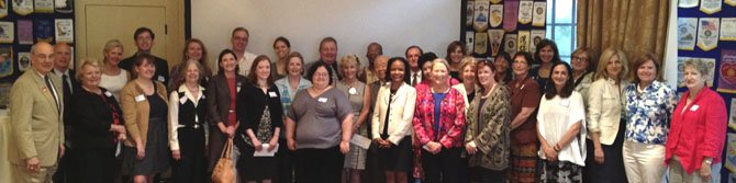 Representatives from local nonprofits gather for a group photo June 12 at the Rotary Club's annual Contributions Day. The club awarded $92,000 to 32 local organization.