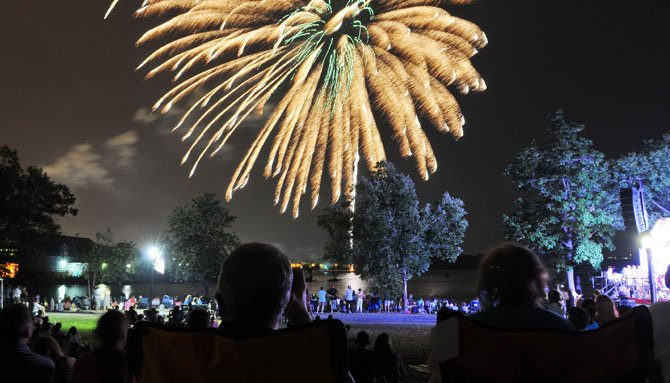 Fireworks brighten the night sky over Oronoco Bay Park at the 2012 celebration of Alexandria’s 263rd birthday.

