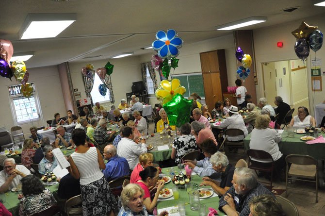 Guests at the first Great Falls Senior Center Activity enjoy lunch Tuesday, July 10 at the Great Falls United Methodist Church. 