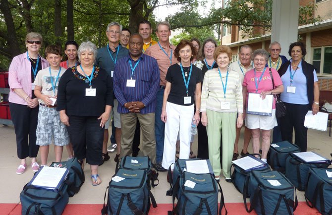 Volunteers, donors and city officials gather at the Hermitage July 14 to celebrate the addition of Saturday delivery for the Alexandria Meals on Wheels program. Funding for the expansion was provided by Spencer Kimball, back row center, and Alexandria Yellow Cab.