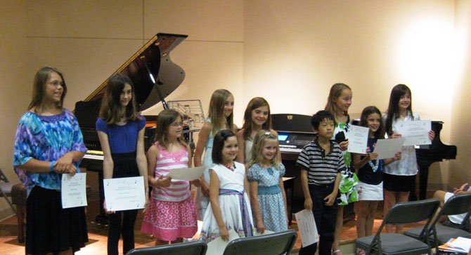 Piano students from Artstars Studio LLC in Great Falls performed in Musical Olympics recitals recently, featuring music from all around the world.