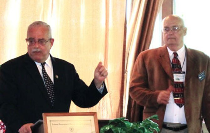 U.S. Rep. Gerald Connolly (D-11) addressing the attendees at NARFE Dulles Chapter 1241's 40th Anniversary Celebration. Chapter President Bill Schmidt joins him at the podium.