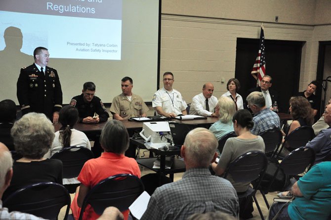 Local aviation officials discuss helicopter noise with McLean residents at the McLean Community Center Thursday, July 26. 