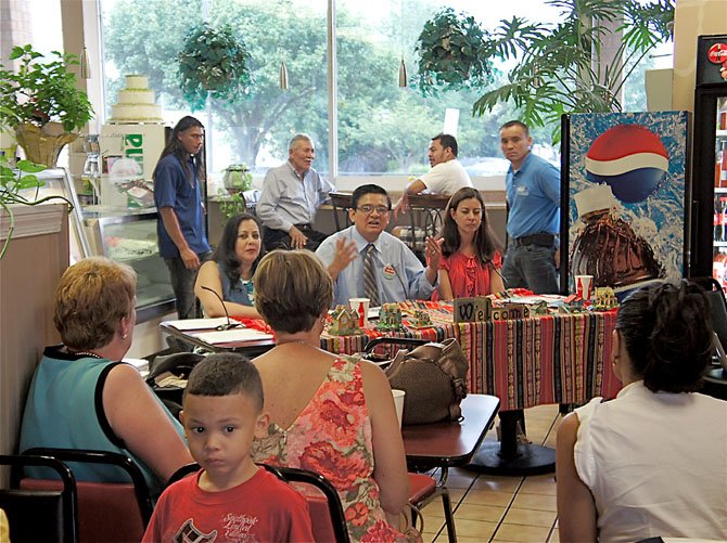 The panel, from left: Patricia Castellanos, Sr. Loan Officer, WestStar Mortgage, Host Mario Rubio, owner of Rubio Real Estate, Mabel Zuleta, Realtor with Long&Foster, Springfield Office. Conducting a Spanish-language outreach program, the three spent over an hour discussing real estate topics and answering questions at the J&S Bakery and Deli in Springfield.