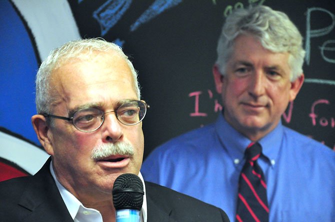 From left, Rep. Gerry Connolly (D-11) and State Sen. Mark Herring (D-33) celebrate the opening of the Obama campaign office in Reston, Saturday, Aug. 4. 
