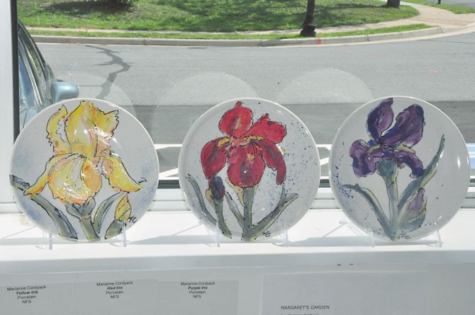 A selection of plates created by artist Marianne Cordyack to pay tribute to the irises at the garden of Margaret Thomas. 