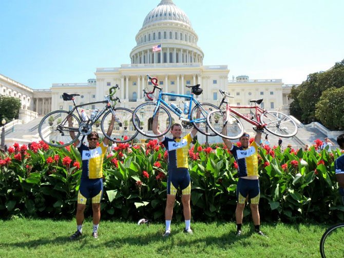 Alexandria's Louis Barnett, at right, celebrates Aug. 5 with fellow Pi Kappa Phi fraternity brothers on the West Lawn of the Capitol after completing the 4,000-mile Journey of Hope bike ride.