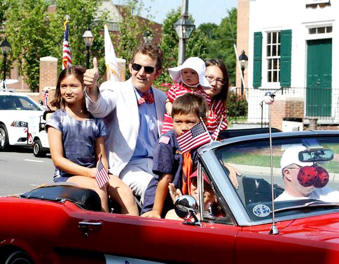 State Senator Chap Petersen (D-34) with his family in the annual 4th of July Parade in the City of Fairfax.