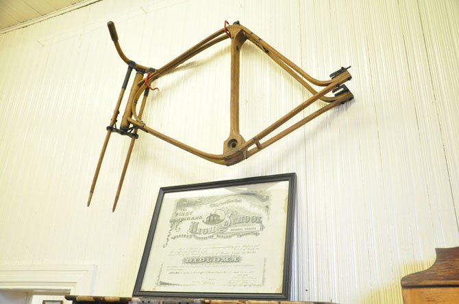 A Herndon High School diploma from 1949 and bicycle frame made out of wood by Herndon resident William Kephart built around 1900, on display at the Herndon Depot museum. 