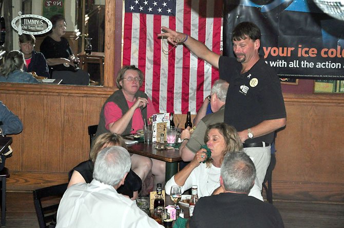 Jimmy Cirrito, owner of Jimmy’s Old Town Tavern, greets customers during a recent fundraiser at the tavern.  