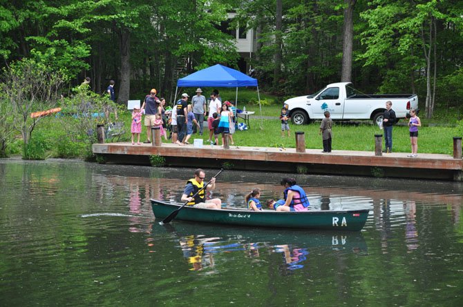 Families boat and fish along Lake Audubon. 