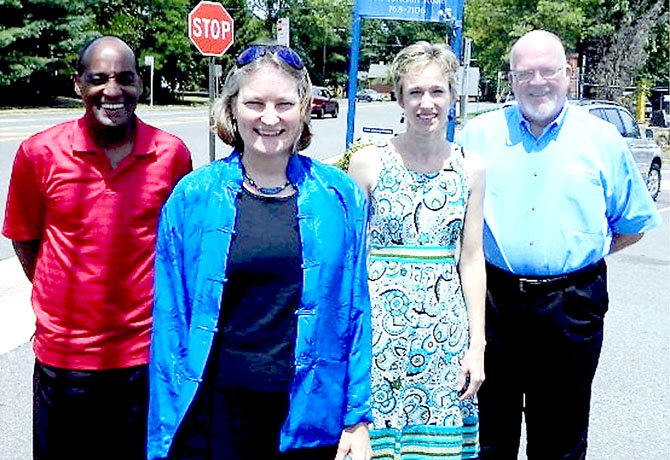 Shirley Marshall, the new executive director at UCM, is flanked by some of her staff: Terry Bibbs (left) director of human resources; Niki Wanner, director of development and communications and Herb Lea, director of community programs. 