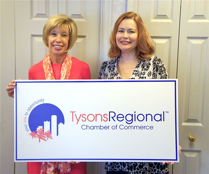 From left—Office Administrator/Events Planner Sharon Brown and Tysons Regional Chamber of Commerce President Lisa Huffman display the chamber's new name and logo.