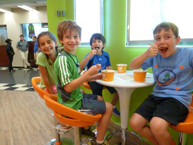 From left: Jacob Fienberg, Lindsay Fienberg, Jack Feldman and Max Miller enjoy Orange Leaf Frozen Yogurt. 