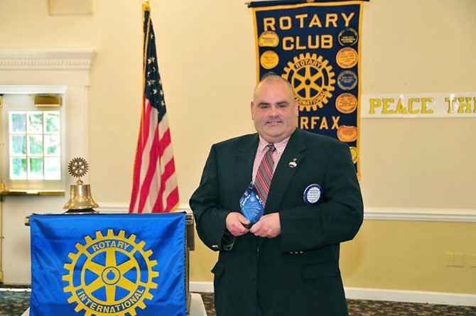 Rick Schroeder, member of The Rotary Club of Fairfax, receiving the Service Above Self award. Photo courtesy of Irby Hollans.