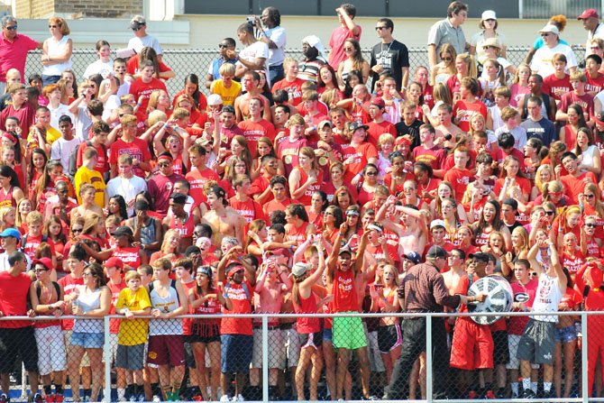 Bishop Ireton students fill the visitors spectator stands for the opening season game against O’Connell last Friday afternoon, Aug. 31.