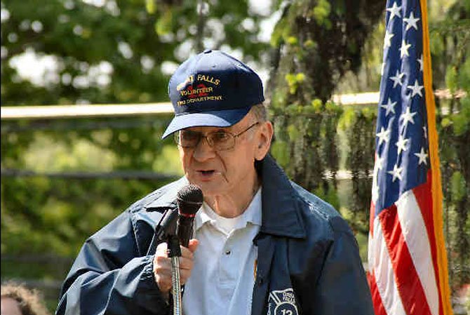 Milburn Sanders welcomes guests to Great Falls Day, Saturday, May 6, 2006 at Great Falls Grange Park.