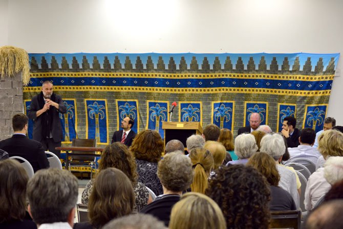 Father Paolo Dall'Oglio, far left, speaking at the Rock Spring Congregational United Church of Christ. Behind him are Nihad Awad, second from the left, executive director of the Council on American-Islamic Relations, the Rev. Frank Fairman, center, a pastor at Rock Spring, Dr. Mahmoud Khattab, second from the right, chairman of the Syrian American Council, and Imam Johari Abdul-Malik, director of outreach at Dar al-Hijrah Islamic Center.