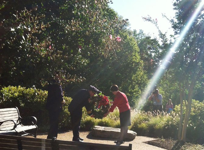 Chairman Sharon Bulova, Fire Chief Ronald Mastin and Police Chief David Rohrer participated in the laying of the wreath at the 9/11 Memorial Grove during a remembrance ceremony at the Fairfax County Government Center the morning of Tuesday, Sept. 11, 2012.