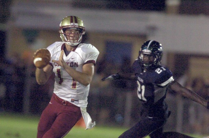 Oakton senior quarterback Kyle Downer threw three touchdown passes and ran for one during a 28-21 victory against South County on Sept. 7.