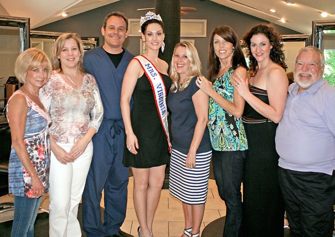 Bellini Salon & MedEsthetics team with Mrs. Virginia.