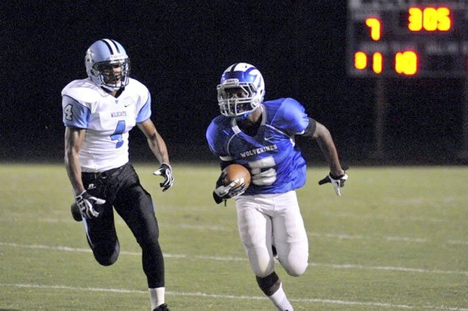 Demornay Pierson-El runs with the ball while being chased by a Centreville defender on Sept. 7.