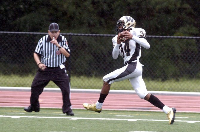 Westfield receiver Devon Burns hauls in one of three touchdown receptions on the day against T.C. Williams on Sept. 8.