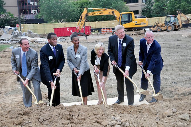 From left, Mark Ingrao of the Reston Chamber of Commerce, Milton Matthews, CEO of the Reston Association, Supervisor Cathy Hudgins (D-Hunter Mill), Jane Raymond of Reston Hospital, Supervisor John Foust (D-Dranesville) and Joe Ritchey break ground for the new Reston Hospital building Monday, Sept. 17. 