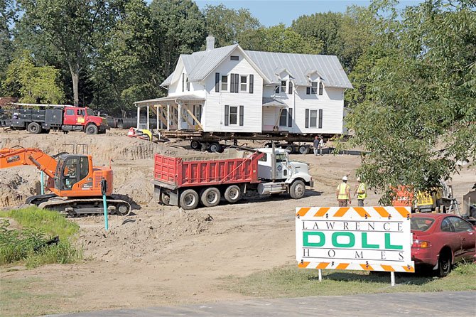 820 Monroe Street about to make the move from its slot on the site--now you see it.