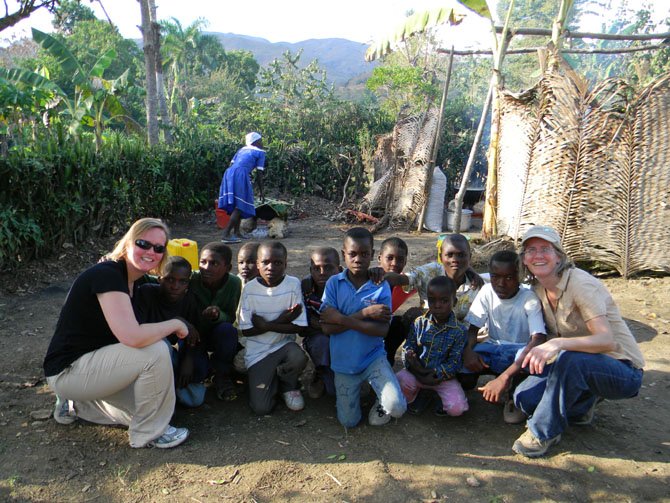 St. Andrew's teachers The Rev. Betsy Carmody Gonzalez, Lower and Intermediate School chaplain, and Racquel Yerbury, Latin teacher and director of St. Andrew's Beyond Borders Program, with Christ Roi students in Civol, Haiti.