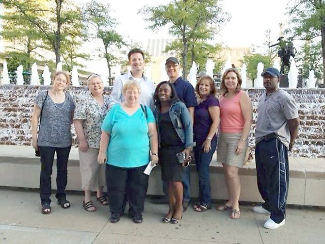 As part of the “100,000” Homes campaign, community volunteers and homeless advocates attend a “boot camp” in Kansas City this summer. (From left) Susan Ryan, New Hope Housing; Lori Mclean, Housing Development; Tom Barnett, OPEH; Nella Leppo, Community Services Board; Jerrianne Anthony, FACETS; Thomas Nichols, Volunteers of America; Carol Erhard, Fairfax County Housing and Community Development; Debbie Scaggs, OPEH; and Vince Jenkins, Reston Interfaith. 