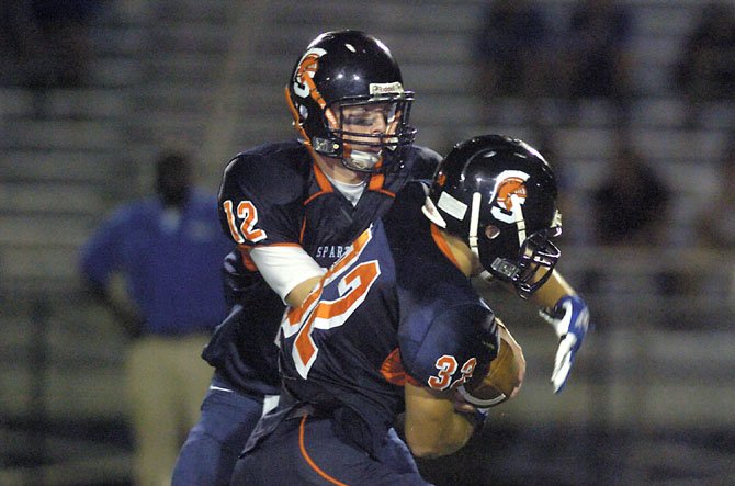 Quarterback Tyler Sutter (12), running back Robert Tobias and the West Springfield football team defeated Lee, 33-14, on Sept. 14.