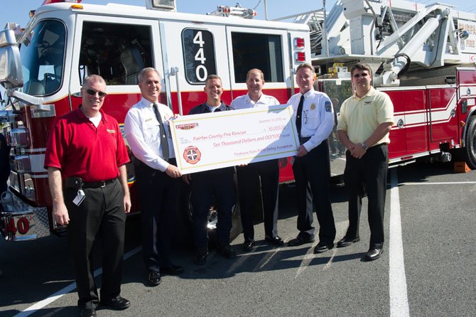 From left are Firehouse Subs’ Mark Gilbert, Assistant Fire Chief John Caussin, Battalion Chief Chris Schaff, Fire Chief Ron Mastin, Deputy Fire Chief James Walsh and Firehouse Subs’ Dan Lowe