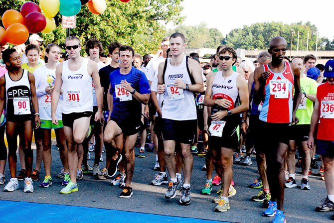 Former Olympian Alan Webb, number 292, participated in the Susco 8K. Tim Susco and Webb were teammates on the South Lakes cross country team. Webb completed the race in 24:19.