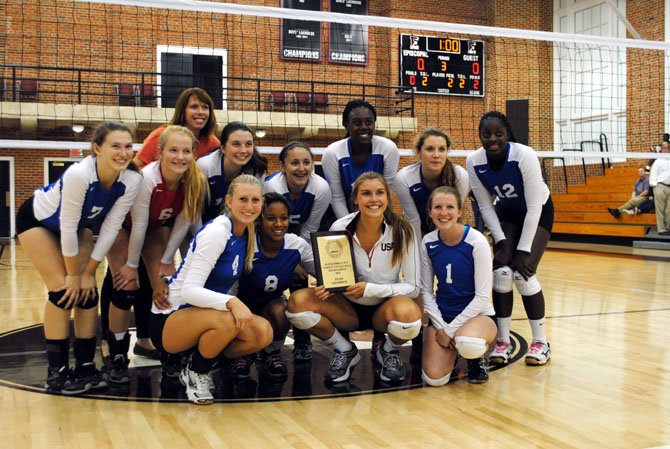 The T.C. Williams volleyball team won the Alexandra City Volleyball Tournament on Sept. 14. From left are: (front row) Sydney Trout, Emerald Taylor, Kate Whitmire, Caroline Chamberlain, (back row) Audrey Dervarics, Savannah Devereux, Kelly Dervarics, Emma Goldberg, McKayla Robinson, Trish Brown, Iye Massaquoi and assistant coach Melanie Bradshaw. The Titans are 8-1 and will host West Springfield on Oct. 2.