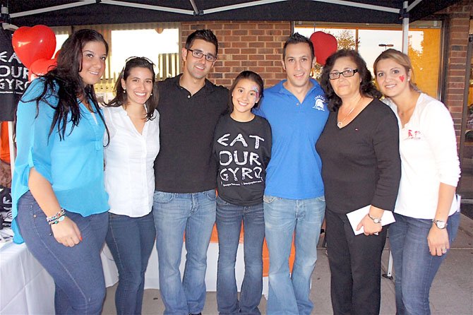 Welcome to Spartans Family Restaurant: Athena Trifonas, Evangelia Tsapos, George Sarantis, Dimetra Sarantis, Angelo Linardakis, Xenia Sarantis and Eleni Sarantis Linardakis are a family united. Together they greeted all comers to the restaurant founder Chris Sarantis' memorial celebration. Mr. Sarantis' widow, Xenia continues to run the family's two restaurants with the help of son George and daughters Eleni and Dimetra, niece Athena, son-in-law Angelo and his sister Evangelia.
