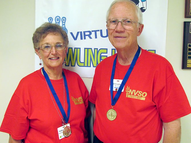 Clint and Vickie Lambert sporting their 2012 gold medals.