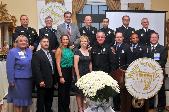 2012 Public Safety Personnel honorees: Franconia Police Station – Detective of the Year Monica A. Meeks, Police Officer of the Year PFC Brooke Wright, Auxiliary Police Officer Dan Wenger and Continuous Service Awardee 2nd Lt. Paul G. Cuzzolino; Mount Vernon Police Station – Detective of the Year David E. Koenigsberg, Police Office of the Year MPO Mark Yawomicky, Volunteer of the Year Woulter K. (Van) Vanderwal and Continuous Service Awardee MPO Greg Kotterman; Fort Belvoir Public Safety – Fort Belvoir Firefighter of the Year James T. Wade and Ft. Belvoir Police Officer of the Year Gregory Bush; Fairfax County Fire & Rescue Department – Volunteer Firefighter of the Year Capt. Deborah Volker, Continuous Service Awardee Technician Robert Hicks, Company Officer of the Year Capt. I Steve Norris, Firefighter of the Year Master Technician Cliff “Chip” Sweeney and EMT/Medic of the Year Capt. II James “Jamie” Lee. With the honorees are Chamber Chairman Michael Gailliot (Hilltop Golf Club) and President Barbara Doyle (Inova Mount Vernon Hospital).
